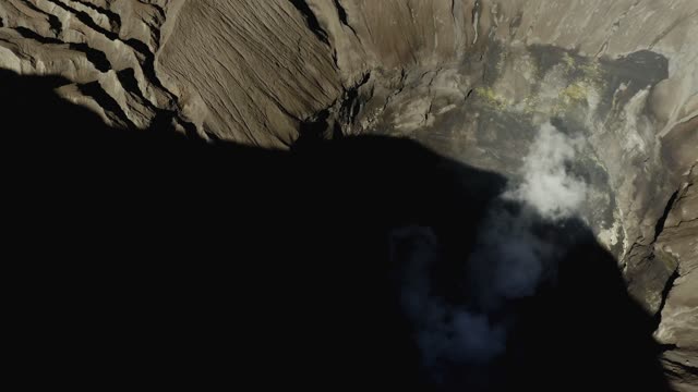 Drone filming the crater of a volcano