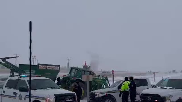 Truckers Break Through Police Barricade