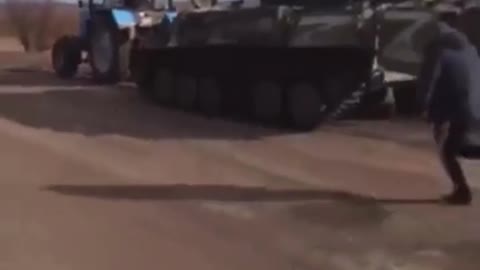 Tank being towed by a tractor !