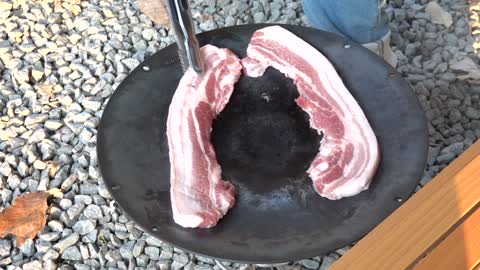 Grilling pork belly, delicious Korean food.