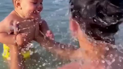 Baby laughing at the beach with dad #shorts #fyp #cute #viral#rumble#virel