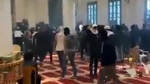 Hamas youth playing football inside Al-Aqsa mosque