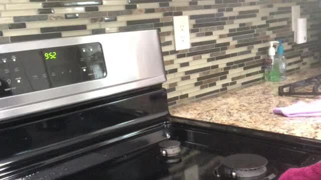 Cleaning the Stove with Envirocloth