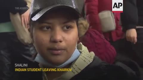 Crowds wait to board trains out of embattled Kharkiv