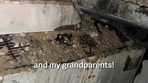 A young Palestinian girl trapped under a 5-floor building,