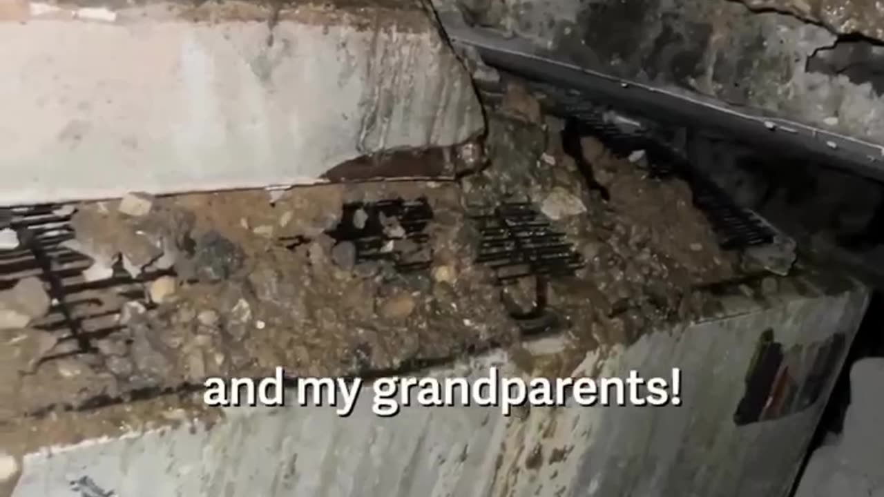 A young Palestinian girl trapped under a 5-floor building,