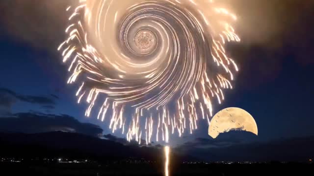 Hundreds of fireworks burst simultaneously in midair