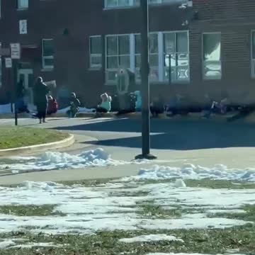 Shocking video shows elementary school kids sitting outside in freezing cold weather