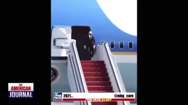 Biden falling down air force one