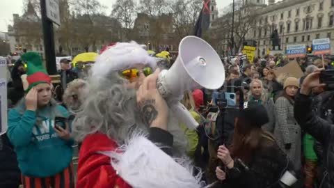 Chants Of "Arrest Boris Johnson" As Protesters Gather Outside UK Parliament.