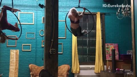 Music gymastics girl in hoop falls and hits neck
