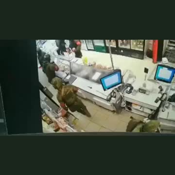 Alleged Russian Soldiers loot & sack grocery store for supplies
