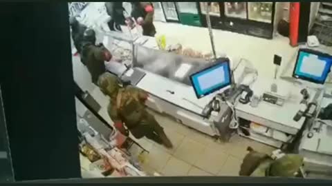 Alleged Russian Soldiers loot & sack grocery store for supplies
