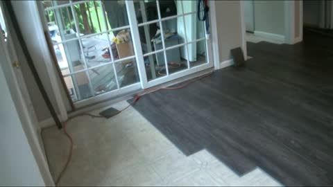 600 sq ft of Mannington Adura Max #003 Sundance Smoke in a kitchen