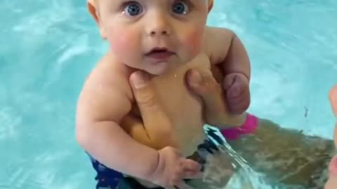 Baby swimming underwater