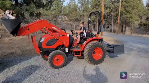 Brody running the Kioti tractor