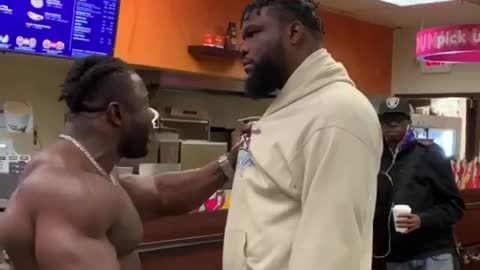 Personal Trainer Kicks Doughnuts Out Of Man's Hand