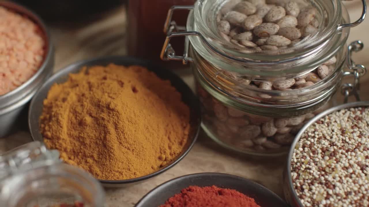 Overhead Tracking In Shot of Herbs and Spices on Table