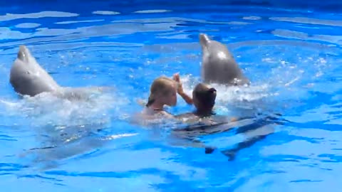 Veronika dancing with dolphins