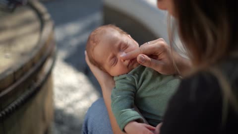 Mother Caressing Baby Face