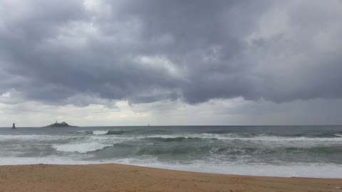 Overwhelmed by the sky and waves on the beach Wow i can't believe it