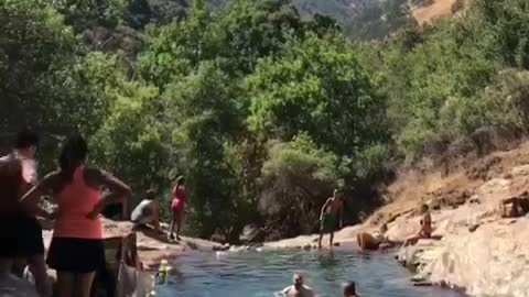 Group of people at river man falls