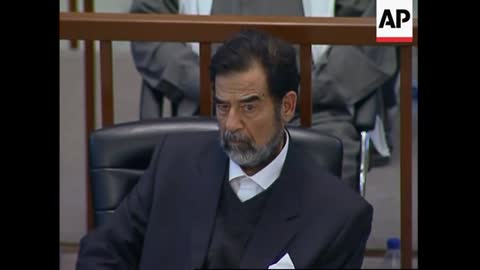 WRAP Saddam Hussein in court, says on hunger strike, turbulent scenes