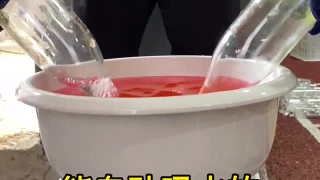 An empty glass bottle that automatically absorbs water