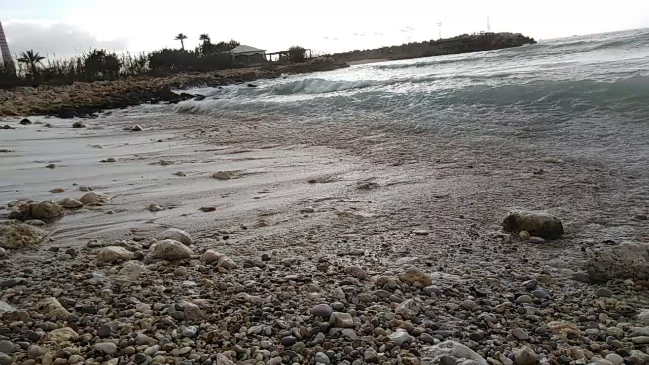 close up sea waves on cloudy day 2021 march