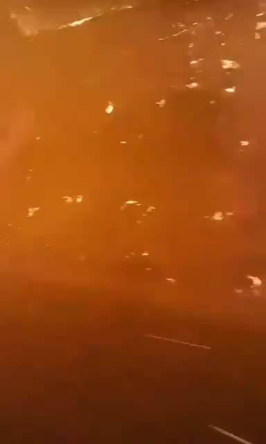 Chilean Fire Fighters Driving Through Flames.