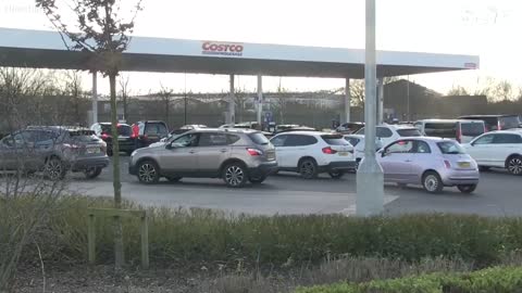 Motorists queue at UK petrol stations as fear prices will rise following russia's attack on ukraine