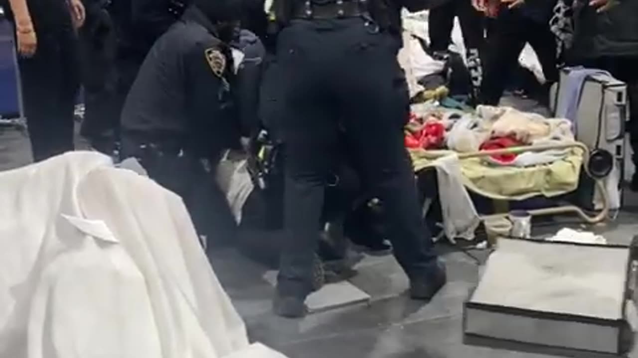 Illegal Migrants Attack NYPD Cops Making Arrest at NYC Migrant Shelter