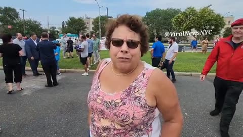 Staten Island. A massive crowd gather after NYC State, it will house migrants @ a nursing home .