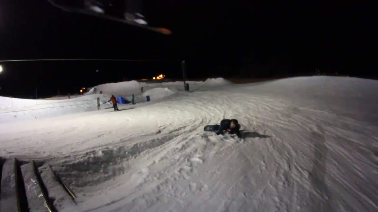 Fallen Snowboarder Nearly Gets Squished