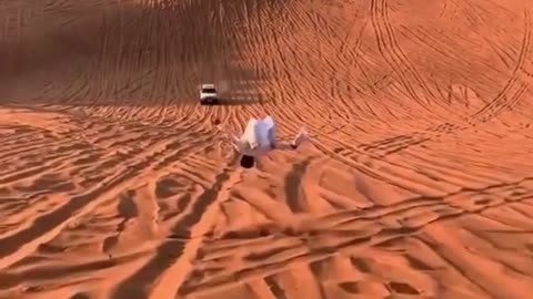 somersaults in the sands in dubai
