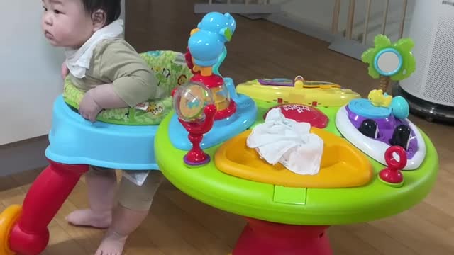 Cute baby learning to walk