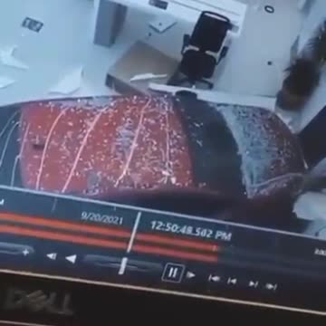 A car driven by a woman breaks into a branch of a telecom office in northern Riyadh