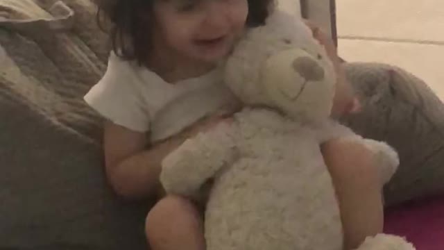Loving her teddy