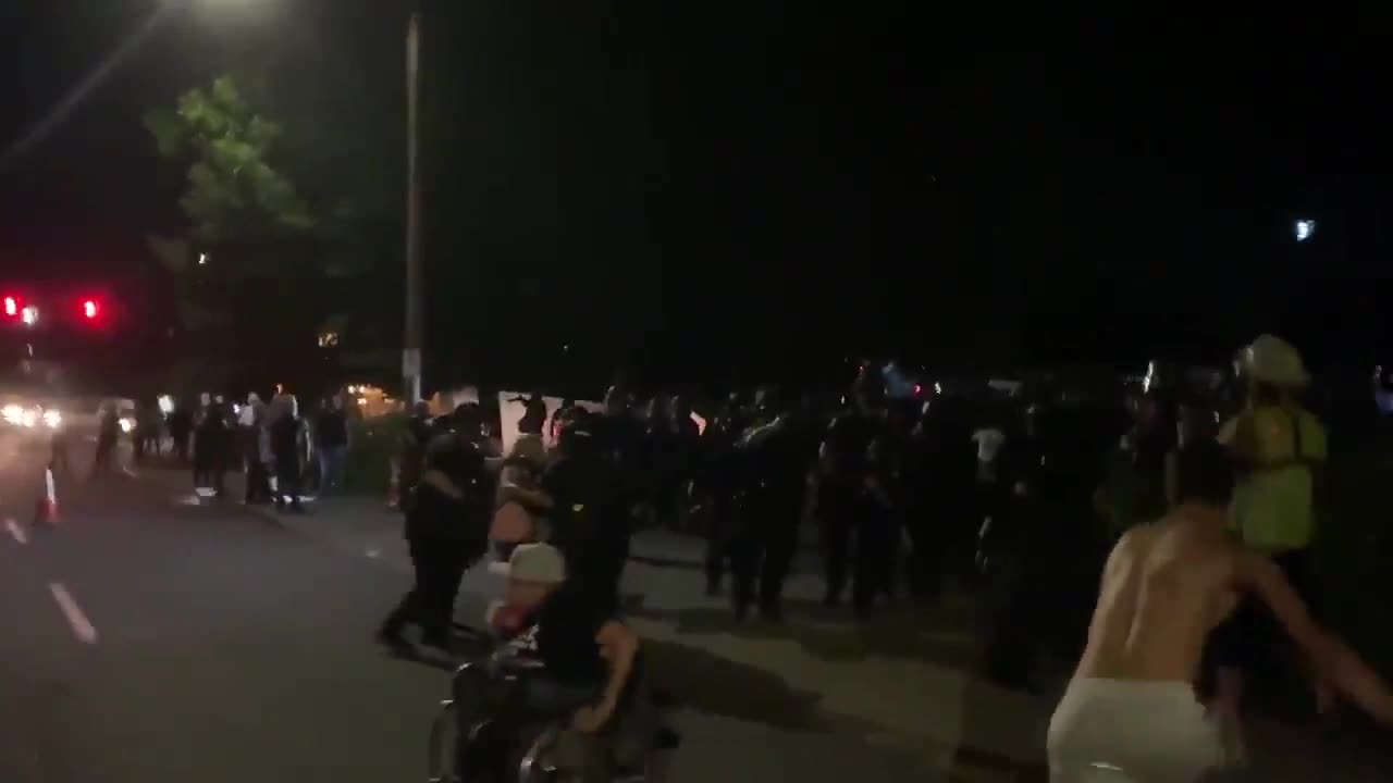 Shirtless Protester Gets Showered With Pepper Spray After Trying to Attack Portland Police