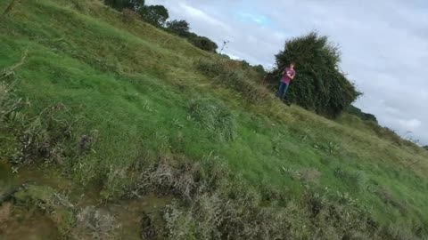 Guy in purple shirt gets hit with drone