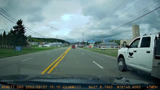 Bus nearly wipes out a truck