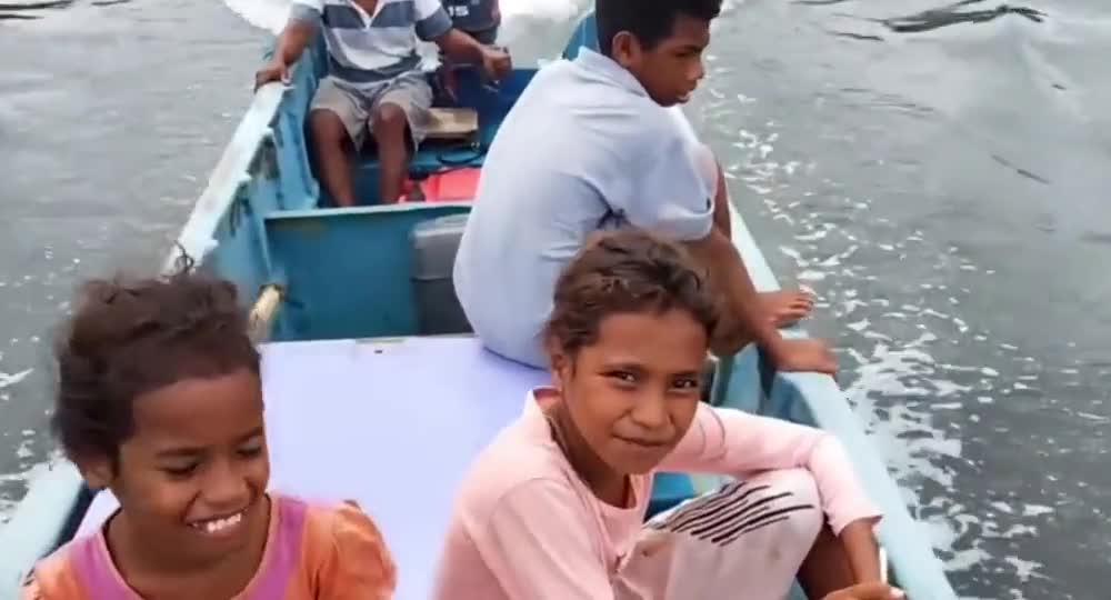 Brazilian fishermen fish deep in the sea