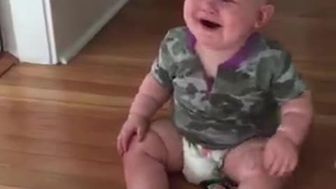 Baby laughing hysterically at mom's sunglasses trick || baby... Laughing