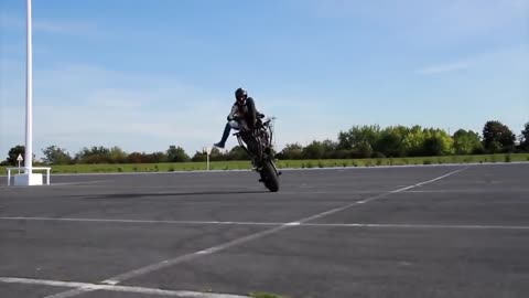 Unbelievable how this girl performs tricks on a motorcycle