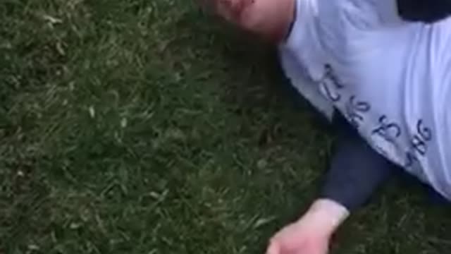 White shirt guy ted laying on grass says what dude what