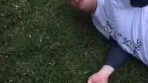 White shirt guy ted laying on grass says what dude what