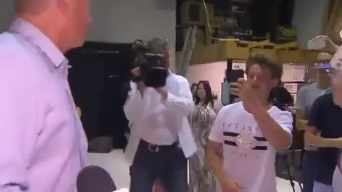 A kid hits Anti-Muslim Australian Senator Fraser Anning on the head with an egg