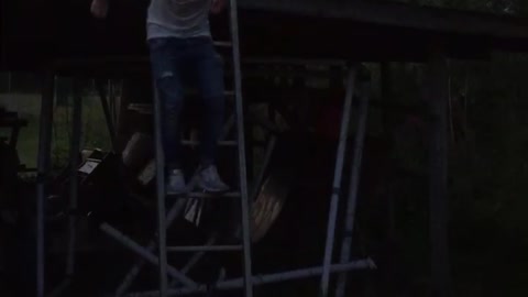 White shirt guy jumps off ladder and breaks foldable table