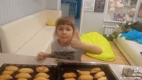 two sisters are baking pies