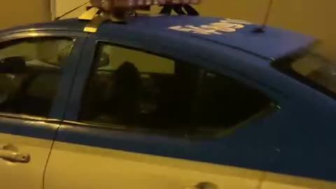 man thinks he is the valentao and climbs on top of the police vehicle in rio de janeiro brazil